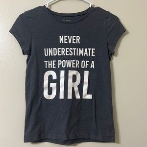 This is a gray top, size L or 10/12, from ‘The Children’s Place’